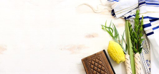 Jewish festival of Sukkot. Traditional symbols (The four species): Etrog (citron), lulav (palm...