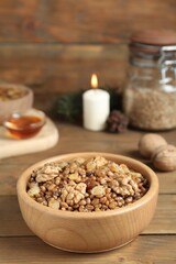 Traditional Christmas slavic dish kutia served on wooden table. Space for text