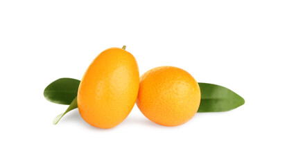 Fototapeta na wymiar Fresh ripe kumquats with leaves on white background. Exotic fruit