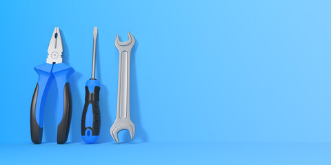 Wrench, screwdriver and pliers on a blue background with copy space. Front view. Minimal creative concept. 3d render illustration