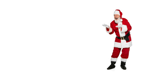 Portrait of cheerful senior man in image of Santa Claus posing with positive expression isolated over white background. Flyer
