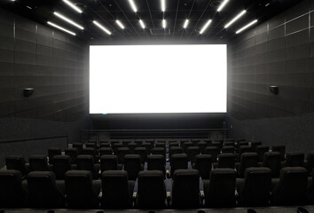Empty cinema hall with black seats. Movie theatre nobody