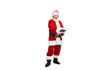 Portrait of senior man in image of Santa Claus writing notes, wish list of presents isolated over white background