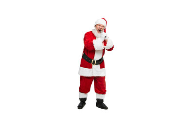 Portrait of senior man in image of Santa Claus singing in microphone isolated over white background