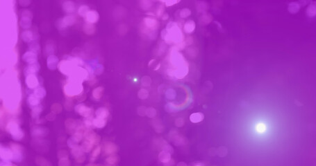 Image of light trails over blurred background