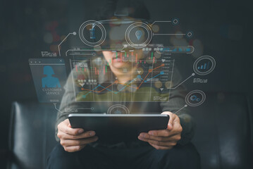 Asian man with VR glasses studying business path simulation sciences at home,curious student wears a virtual reality to study science home online study futuristic lifestyle learning