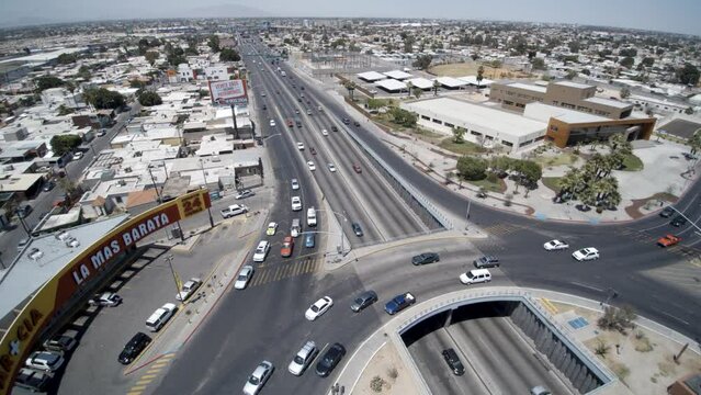 View of a drone flying back over a roundabout