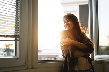 Woman looking out the window