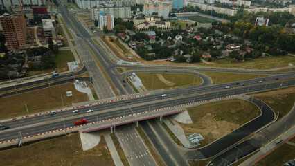 Busy city highway. Major road junction. Urban landscape. Aerial photography.