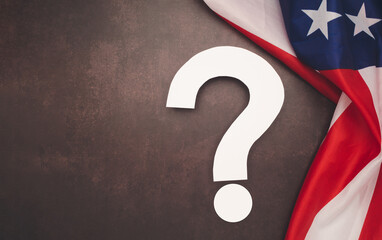 White question mark over a vintage background with the American flag