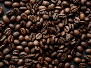 Coffee beans in a holder on a black background