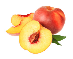 Whole and cut delicious peaches with green leaves isolated on white
