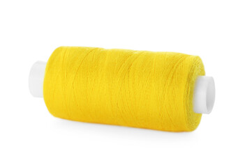 Spool of yellow sewing thread isolated on white