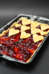 Appetizing sweet dessert cake with berries jam
