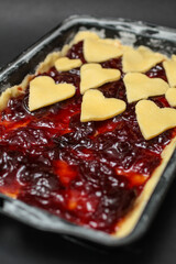 Appetizing sweet dessert cake with berries jam