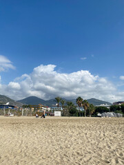 View from the beach to the mountain and the city