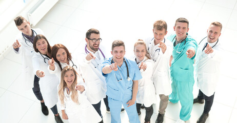 top view. large group of medical professionals pointing at you