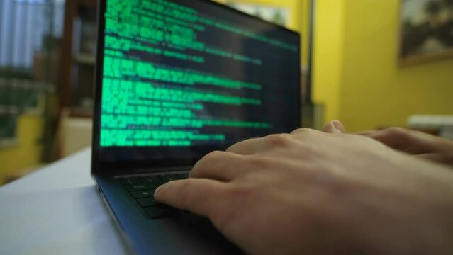 Hacker man working on pc laptop privacy data decript,cyber security hacking attack