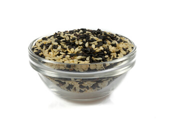 Fototapeta na wymiar mixed sesame seeds in a glass bowl isolated on white background
