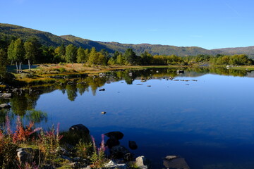 lake and mountain reflections in Autumn, Geilo, Norway