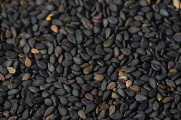 Black sesame seeds close up.