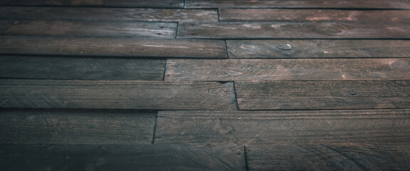 Weathered wooden planks background. Vinage wooden surface with with offset planks pattern....