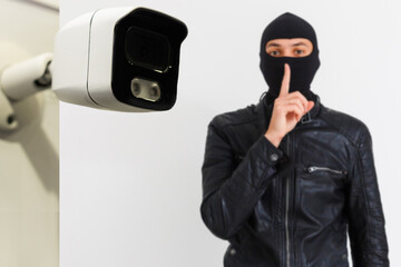 CCTV Camera Showing A Burglar Stealing Things In The House.