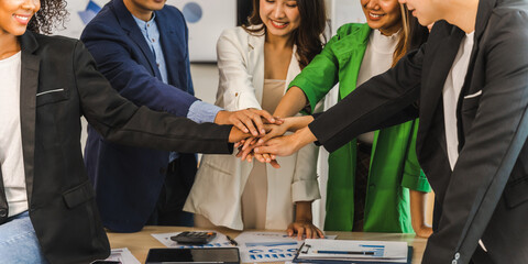 Happy working together successful team of business people mixed race teamwork join hand at office...