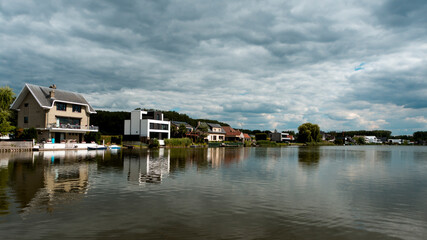 Fototapeta na wymiar Lakeside residential area in Berlare, Belgium