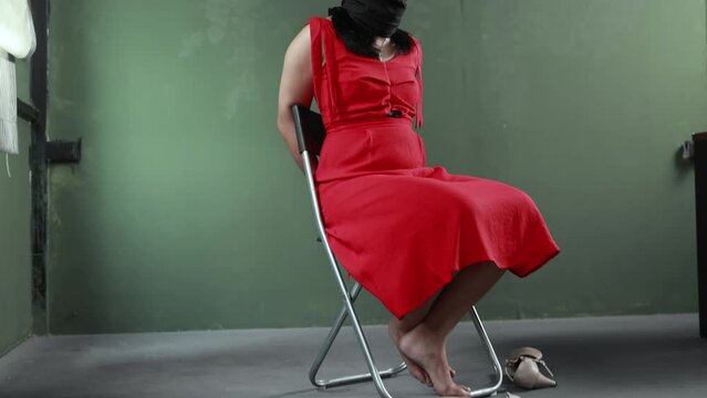 Asian woman abducted victim tied up in abandoned room