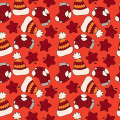 Autumn doodle pattern with leaves, warm socks, hats. Seamless cozy fall background, print for fabric, wrapping paper. Hand drawn cute cartoon vector illustration