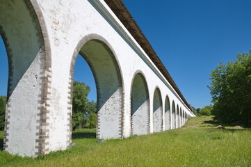 Rostokinsky Aqueduct in Moscow on a sunny summer day, Russia. Built to supply water to Moscow, is a monument of architecture and historical heritage