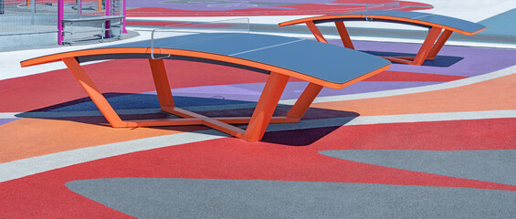 Curved tables for teqball in sport court