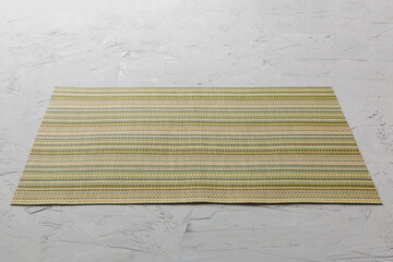 Perspective view of tablecloth for food on cement background. Empty space for your design