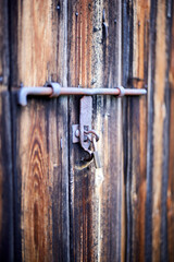 old wooden door with big door lock