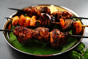 Grilled chicken tikka kebab or kababs on skewer, selective focus