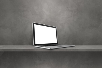 Laptop computer on grey shelf background