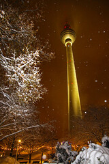Snowy winter in Berlin, Germany. Night view of Berlin TV Tower