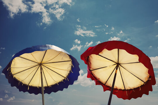 red umbrella and blue sky