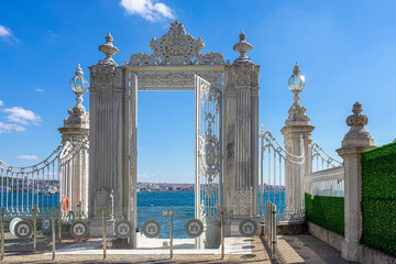 Dolmabahce Palace gate to the Bosporus. Dolmabahce is the largest palace and one of the most...