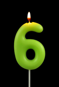 Burning Green Birthday Candle Isolated On Black Background, Number 6