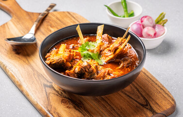 Mutton curry or Mutton gravy is a delicious Indian curried dish of soft tender chunks of meat in spicy onion tomato gravy