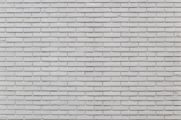 Background image striped brick wall painted white, visible fine textures.