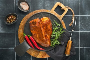 Raw steak t-bone or porterhouse. Steak t-bone or porterhouse in sauce with spices, salt and...