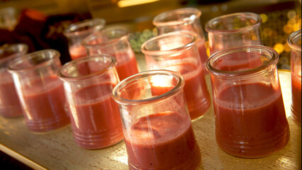 Juice in glasses. Smoothies and Juices in glass jars.