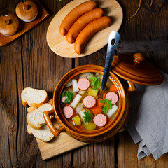 Potato kohlrabi soup with bockwurst
