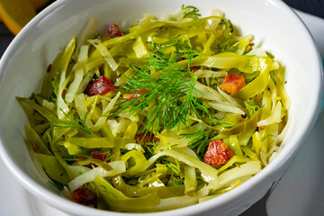 White cabbage with dill and diced bacon