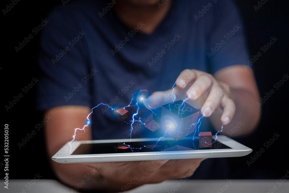 Poster man holding a tablet in his palm and showing off his creativity and speed of internet communication 