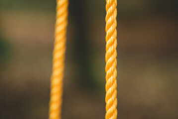 Two yellow ropes on the colorful background