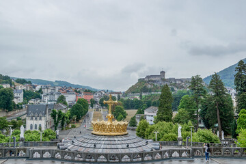 A panorama from Basilica of the Virgin Mary of Rosaire to the Fortress of Lourdes, France.